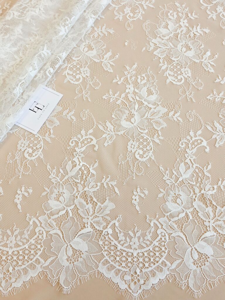Light ivory French Chantilly lace fabric buy online by the meter