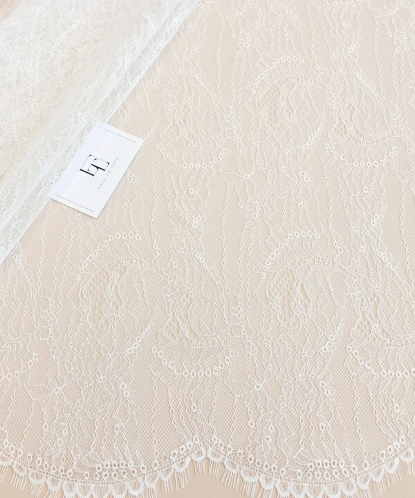 Light ivory French Chantilly lace fabric buy online by the meter