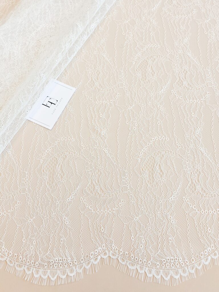 Light ivory French Chantilly lace fabric buy online by the meter