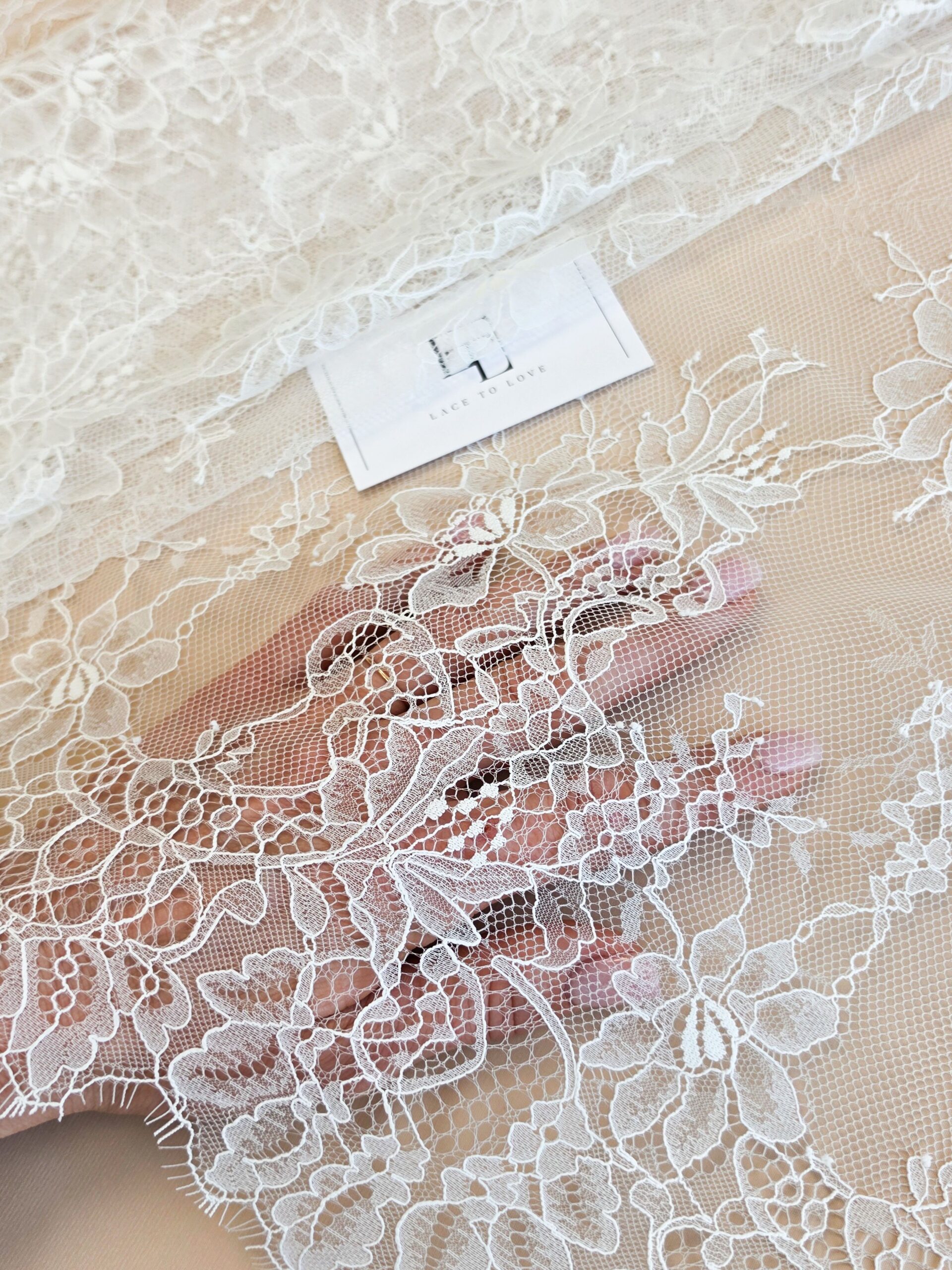 Delicate off white bridal lace fabric