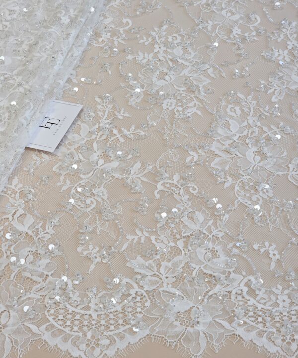 Embroidered light ivory French Chantilly bridal lace fabric buy online by the meter
