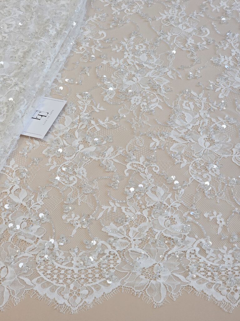 Embroidered light ivory French Chantilly bridal lace fabric buy online by the meter