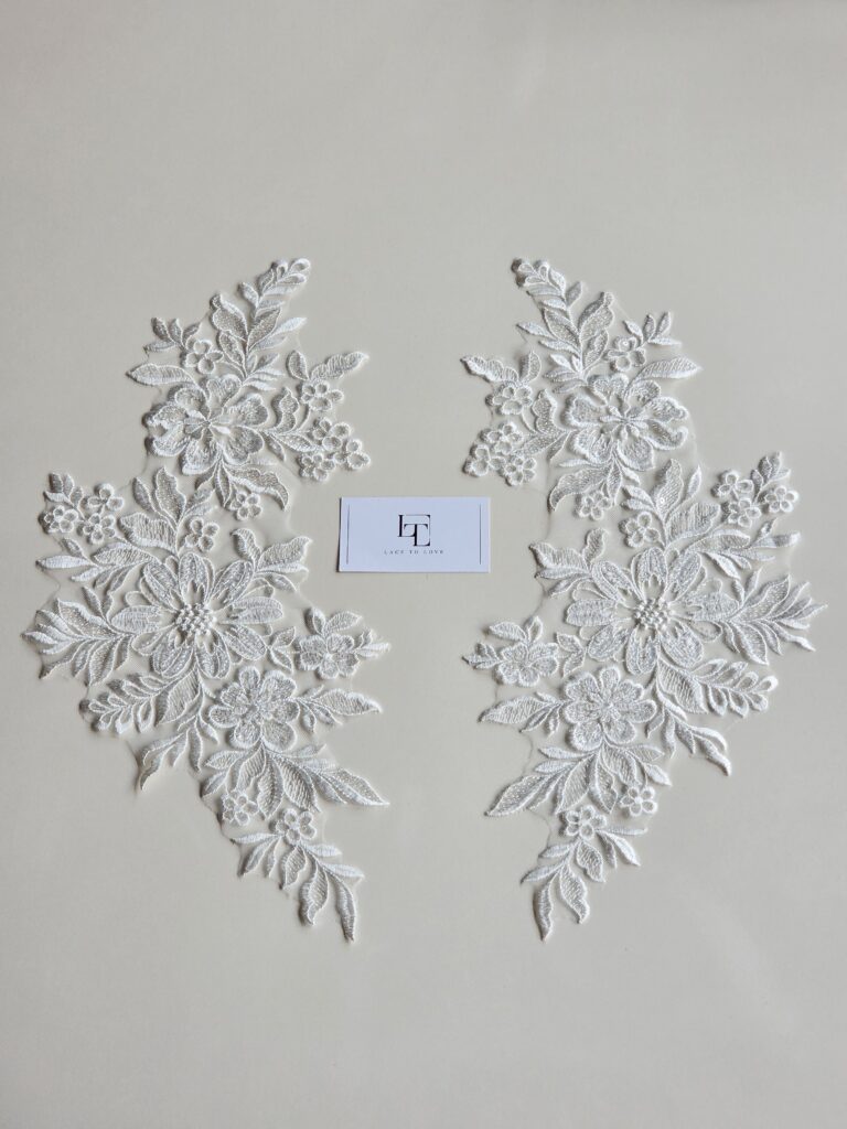 Ivory embroidery lace motiffs sold by the yard